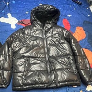 Black female coat, about a large.